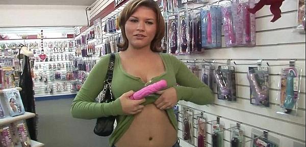  Hot slut Leigh Livingston masturbating in public inside a porn store